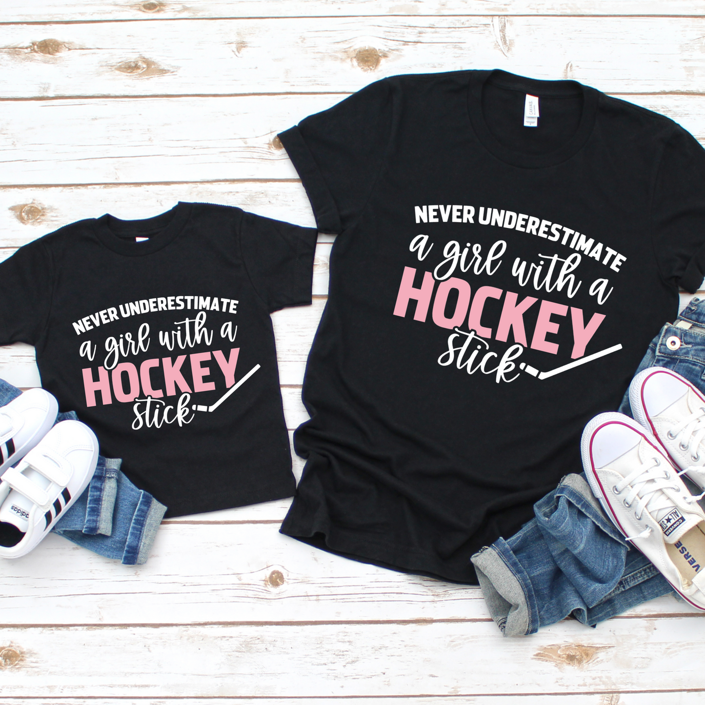 Never underestimate a girl with a hockey stick tee